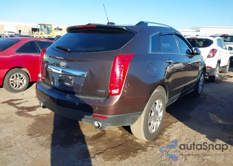 2015 Cadillac Srx Luxury Collection z USA, uszkodzony, nr VIN 3GYFNBE38FS530321